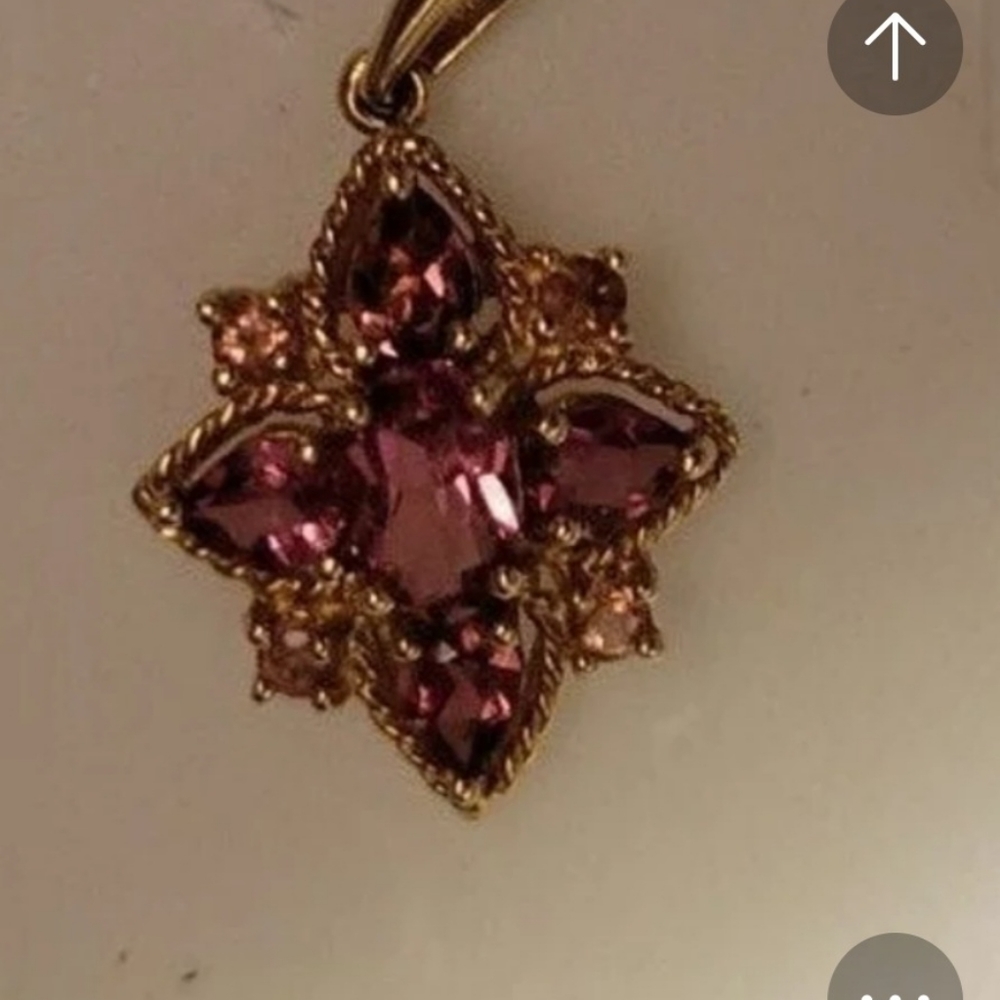 Id love to sell this piece! 10k yellow gold pink tourmaline pendant. 15x22mm